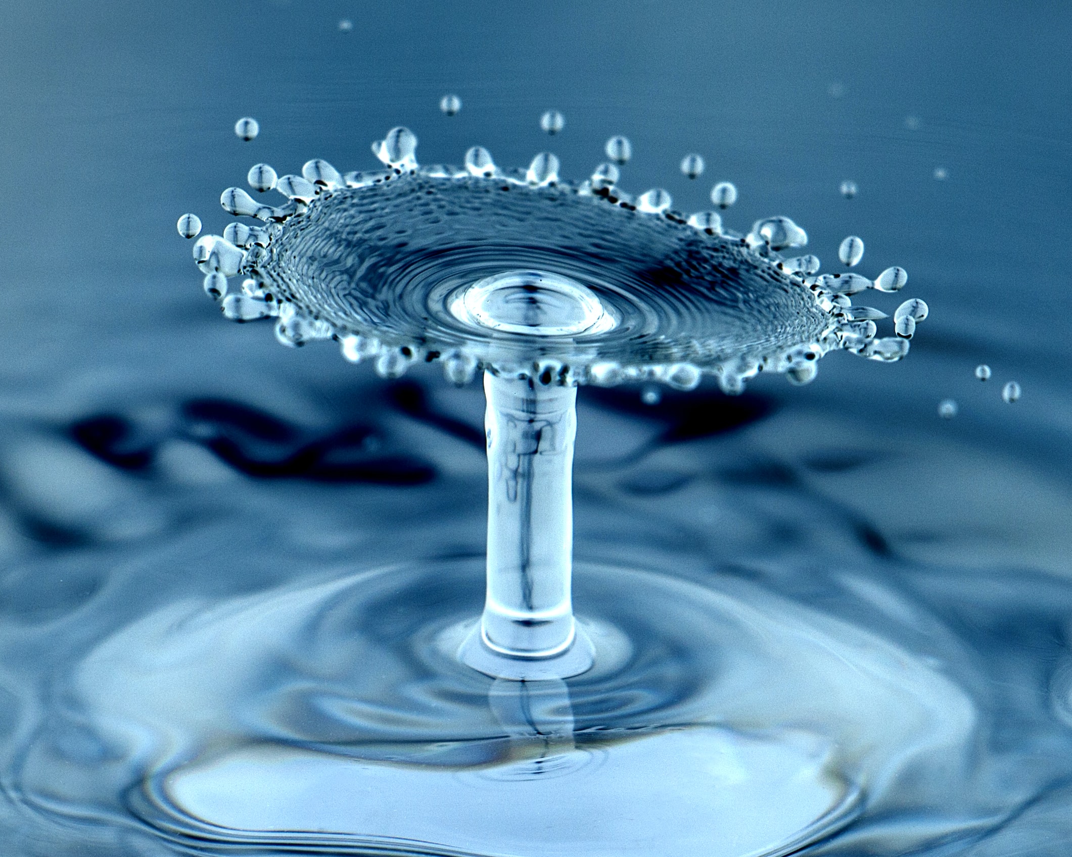 A close up of a water droplet splashing