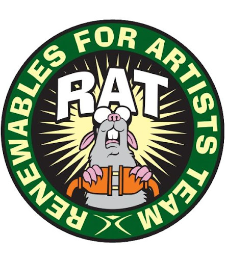 A cartoon rat holding a power cable with electrical sparks behind it and the word RAT in large bold letters above it, all encompassed in a circle with the words Renewables for Artists Team