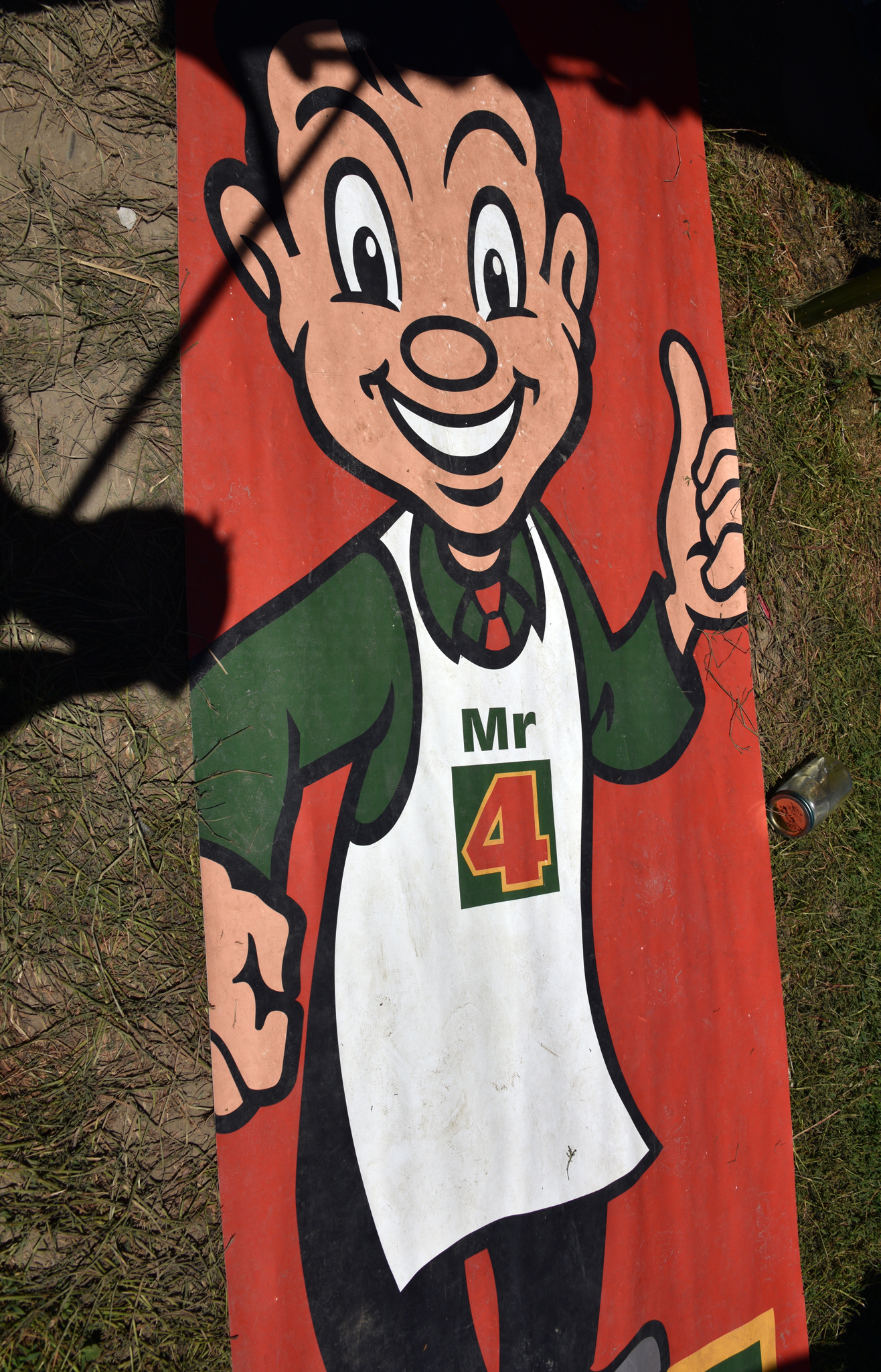 A flag of a cartoon man wearing a white apron with 'mr 4' written on it, giving the thumbs up