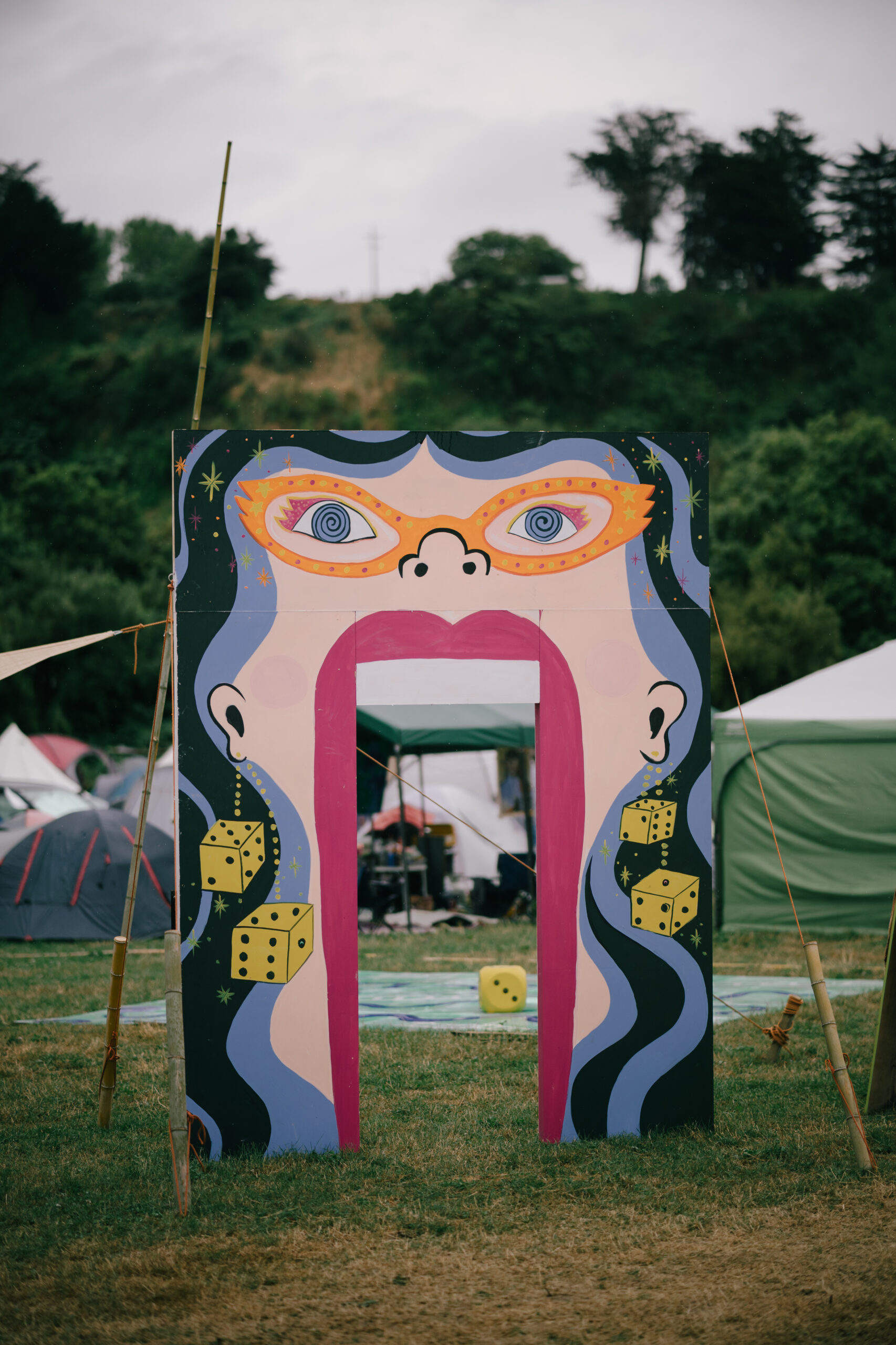 an artwork of a large face with its mouth as an open door