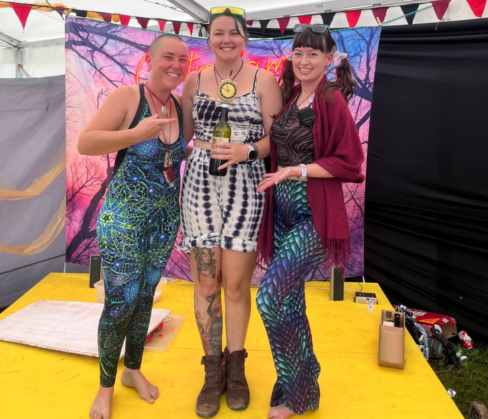 DoP team members stand in centre camp proudly holding the winning trophy