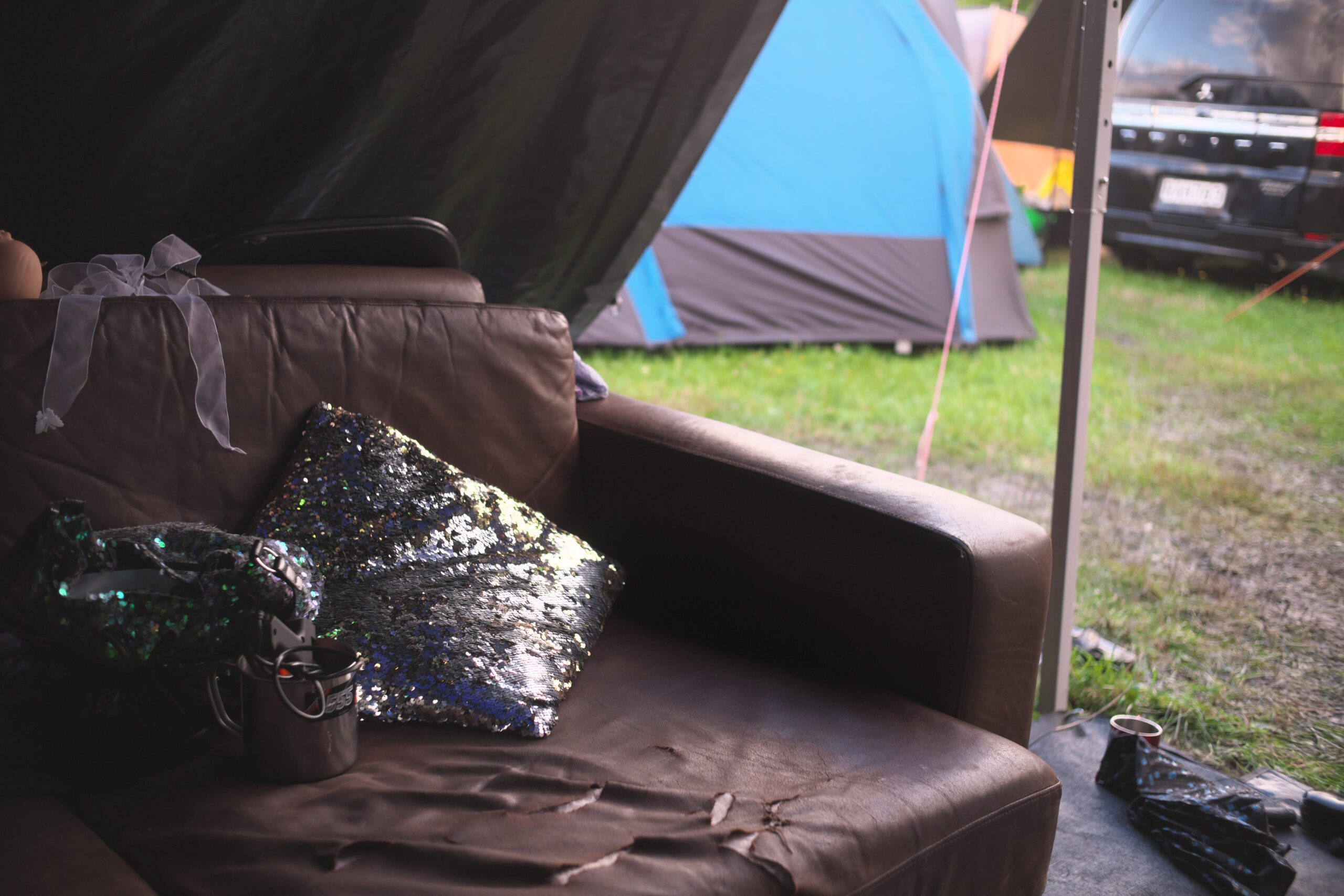 An image of a couch in a tent